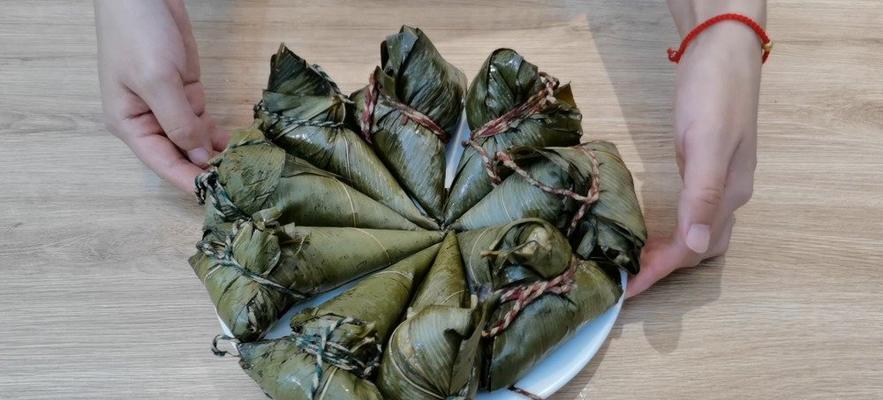 集成灶煮粽子的绝佳方法（使用集成灶煮出美味可口的粽子）  第1张